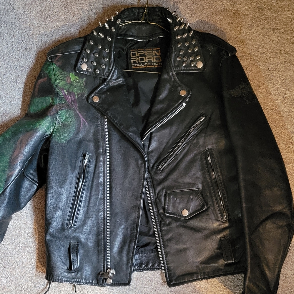 Punk style genuine leather jacket.